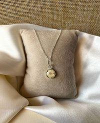 Ivory petal locket