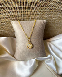 Ivory petal locket